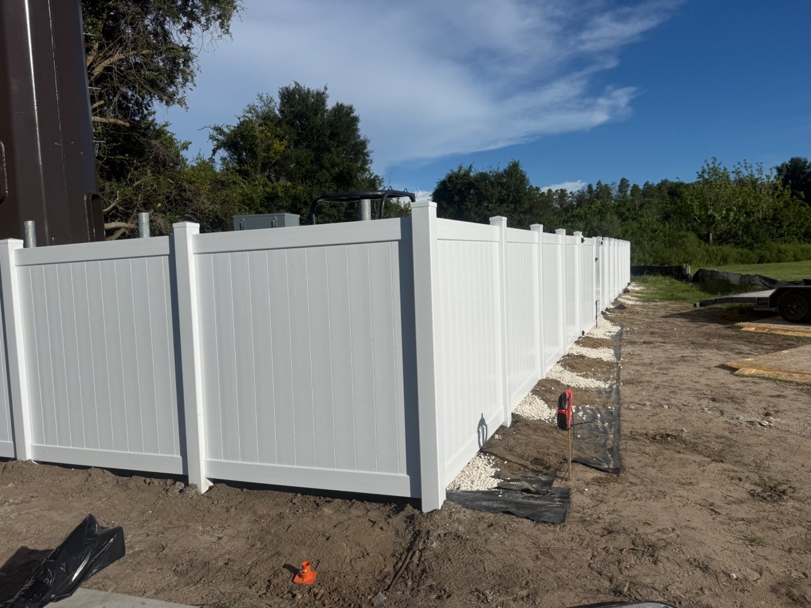 White vinyl fence corner and gate
