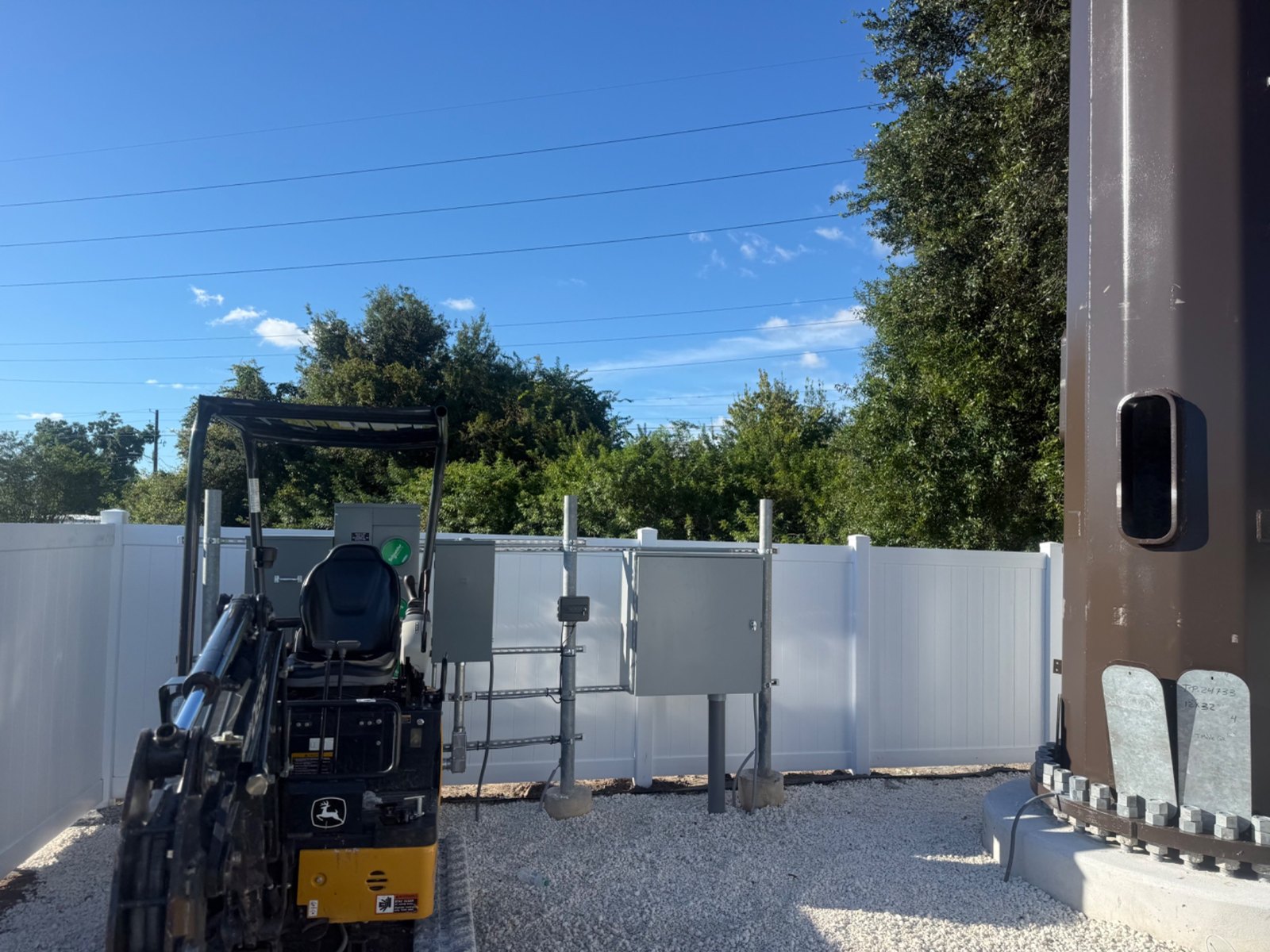 Vinyl fencing at an active project site