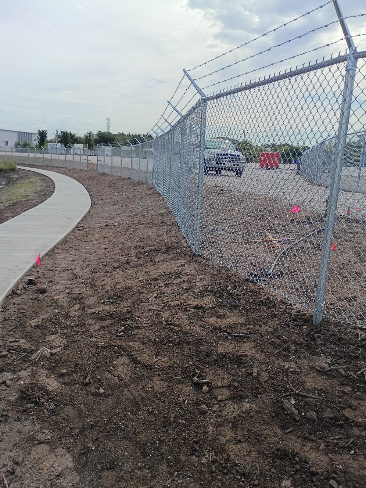 Chain link mesh and posts at a project site