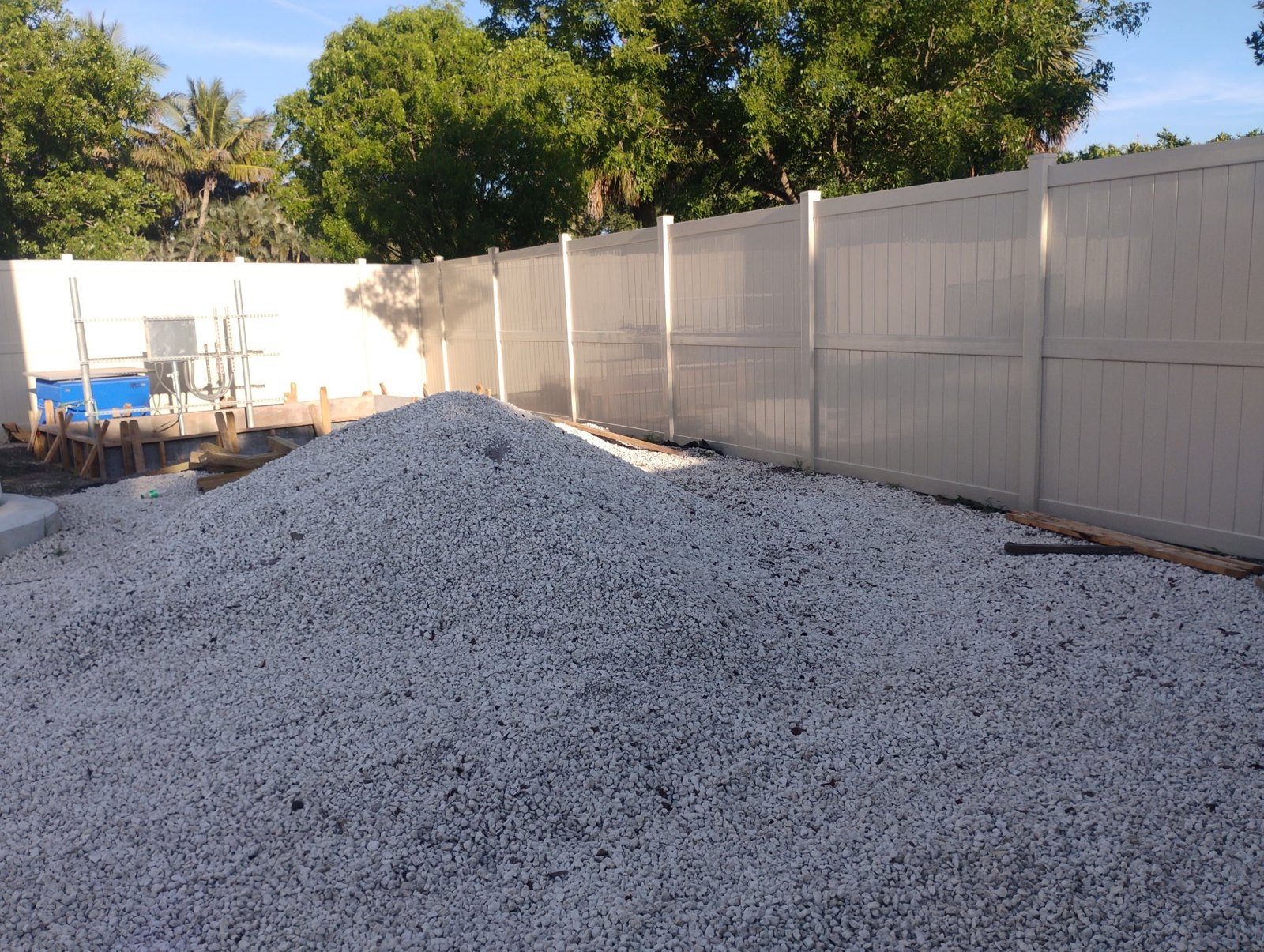 Tan vinyl privacy fencing — view 4