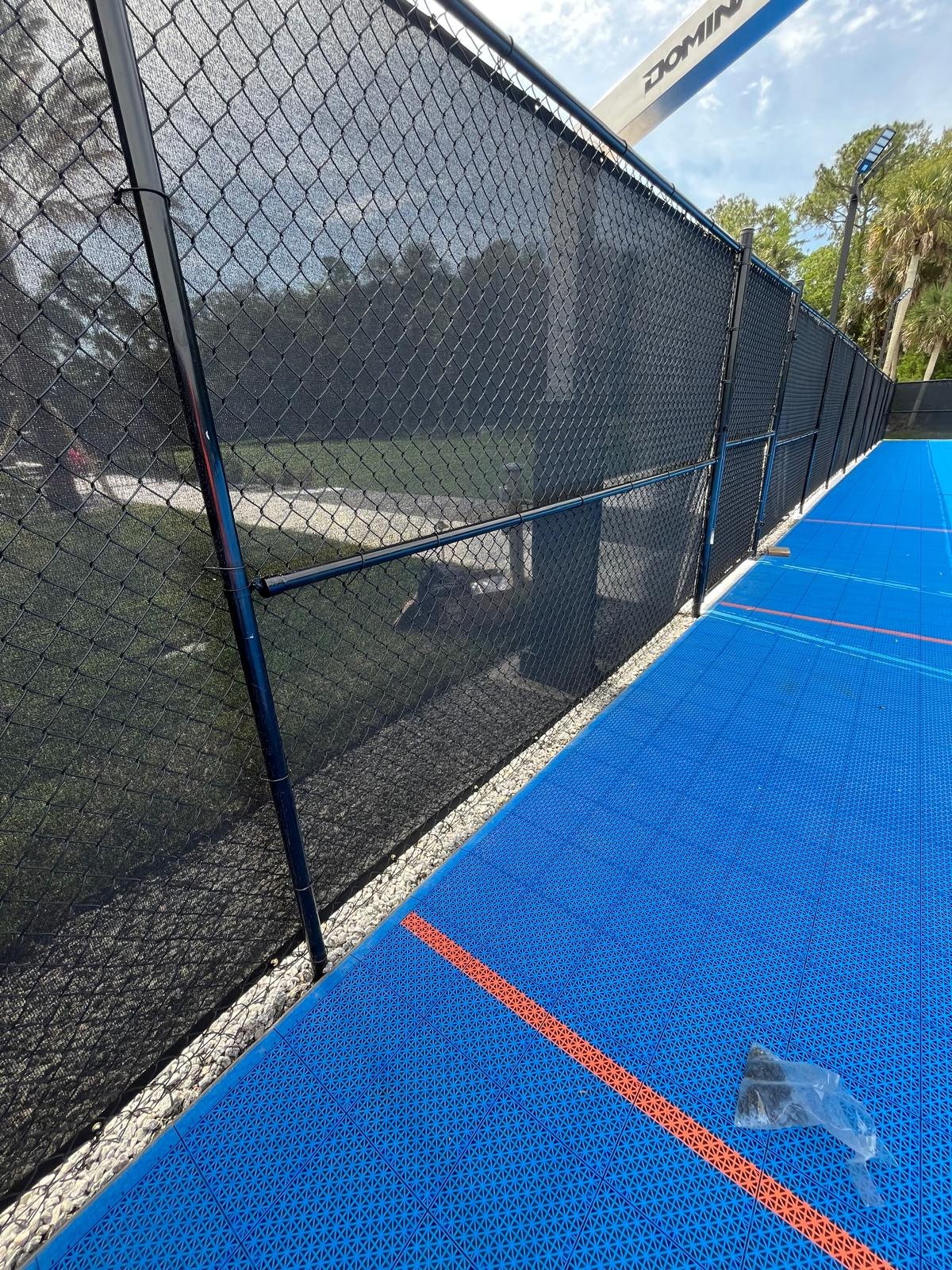 Black court fencing with windscreen — view 8