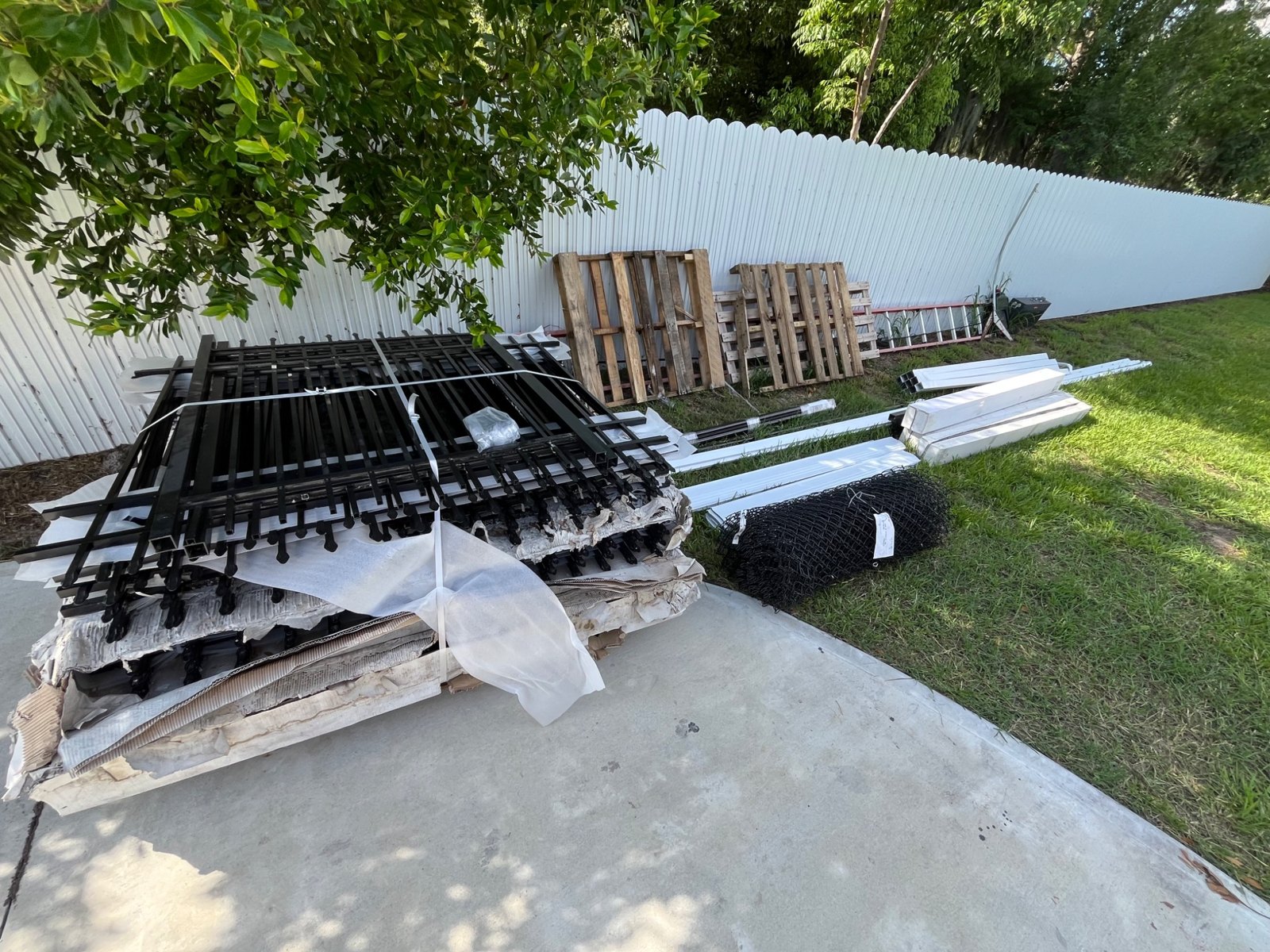 Fence materials staged for a customer order